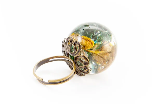 Ring in resin with flower — Stock Photo, Image