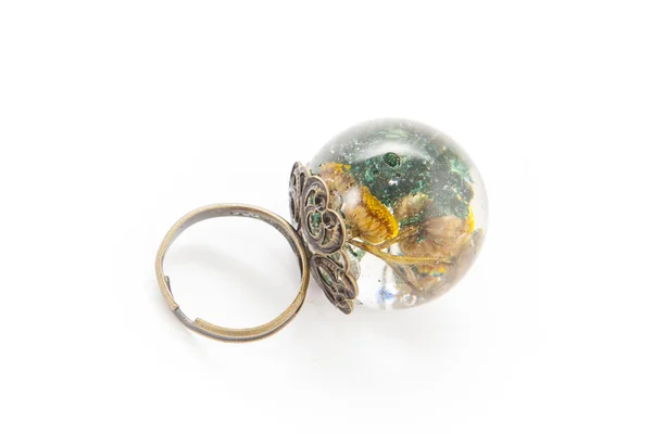 Ring in resin with flower — Stock Photo, Image