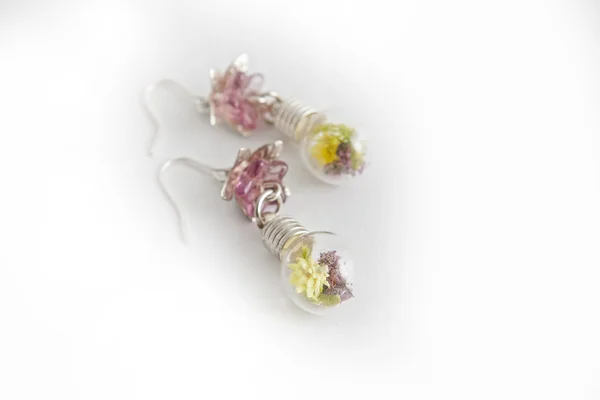 Earrings with flowers with resin — Stock Photo, Image
