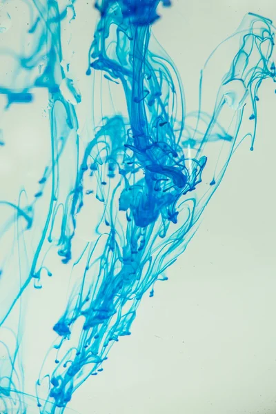 Blue liquid in water — Stock Photo, Image