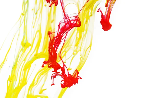 Red and yellow liquid in water — Stock Photo, Image