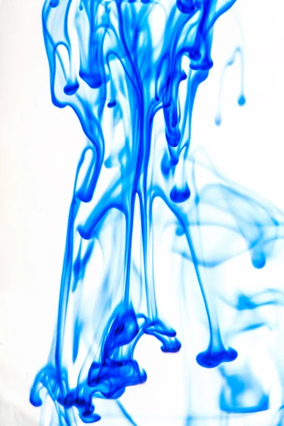 Blue liquid in water — Stock Photo, Image