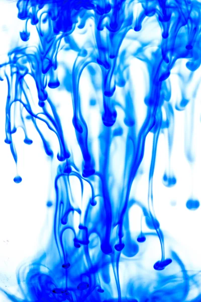 Blue liquid in water — Stock Photo, Image