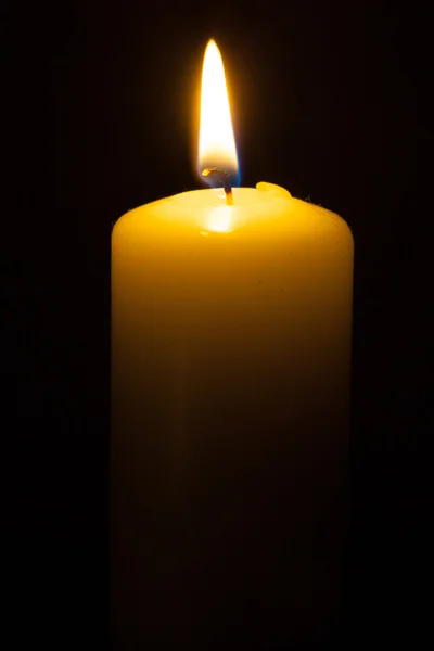 Candle on the black background — Stock Photo, Image