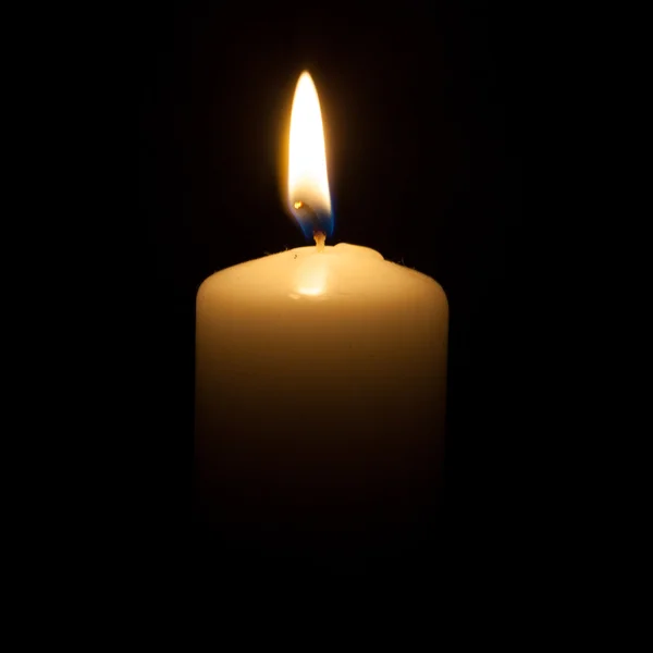 Candle on the black background — Stock Photo, Image