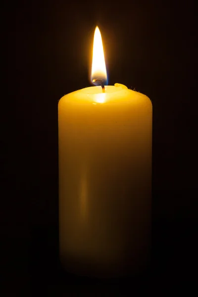 Candle on the black background — Stock Photo, Image