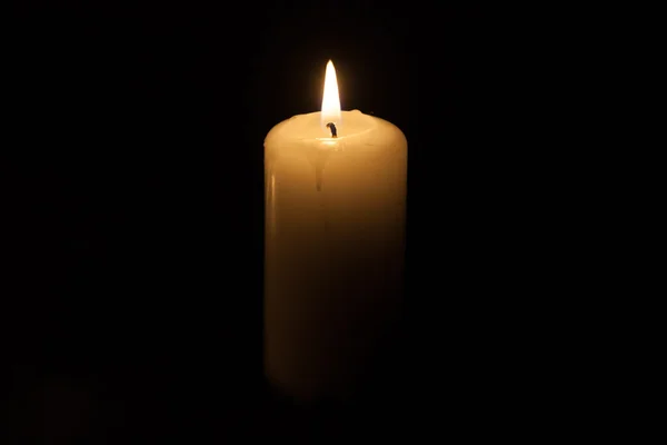 Candle on the black background — Stock Photo, Image