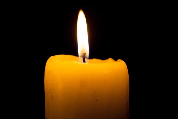 Candle on the black background — Stock Photo, Image