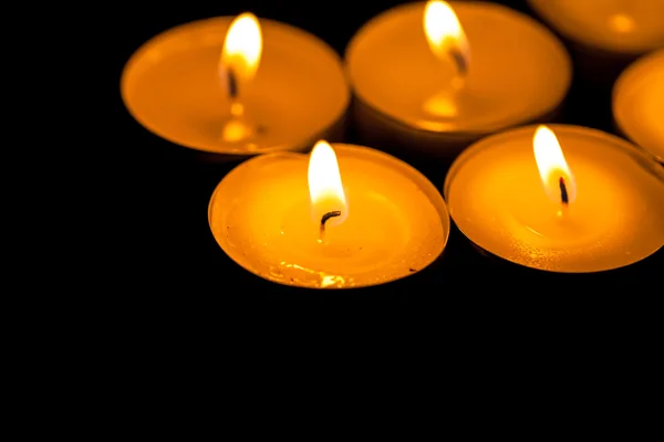Candles cutting through the darkness — Stock Photo, Image