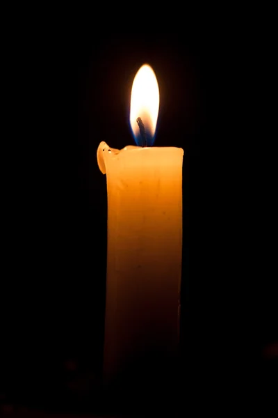 Candle on the black background — Stock Photo, Image