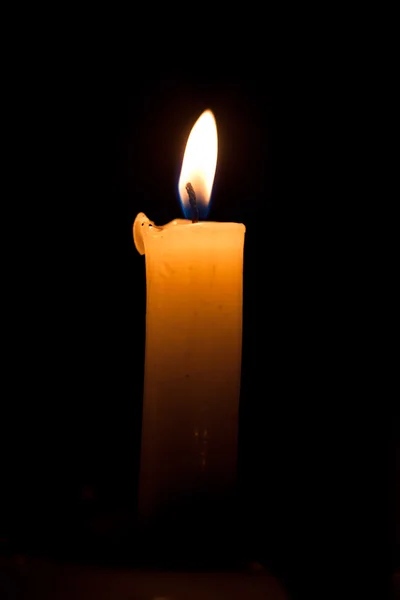 Candle on the black background — Stock Photo, Image