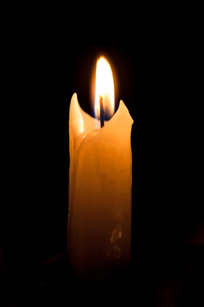 Candle on the black background — Stock Photo, Image