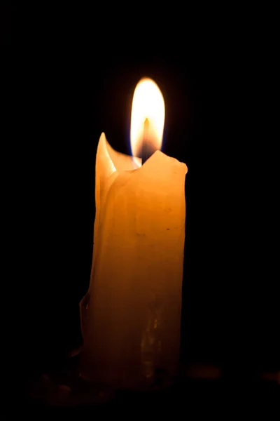 Candle on the black background — Stock Photo, Image