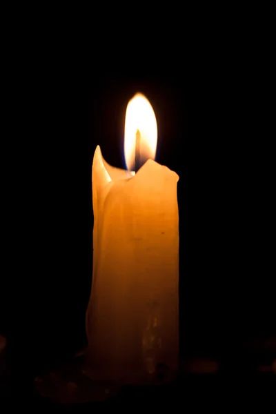 Candle on the black background — Stock Photo, Image