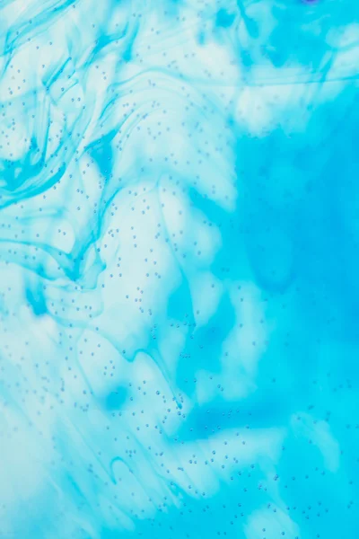 Blue liquid in water — Stock Photo, Image