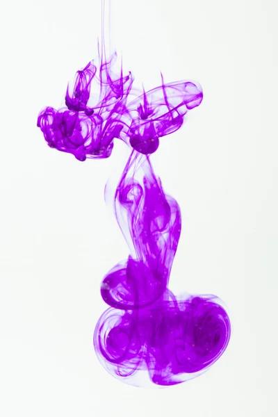 Violet liquid in water — Stock Photo, Image