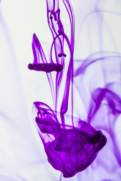 Violet liquid in water — Stock Photo, Image