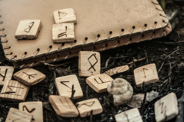 Wooden runes on the ground — Stock Photo, Image