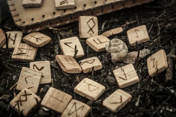 Wooden runes on the ground — Stock Photo, Image