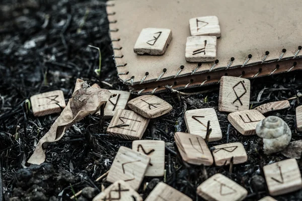 Wooden runes on the ground — Stock Photo, Image