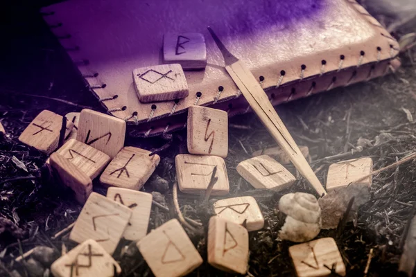 Wooden runes on the ground — Stock Photo, Image