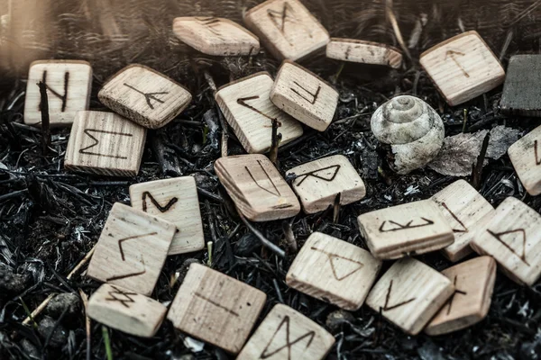 Wooden runes on the ground — Stock Photo, Image