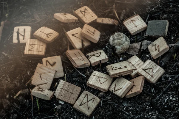 Wooden runes on the ground — Stock Photo, Image