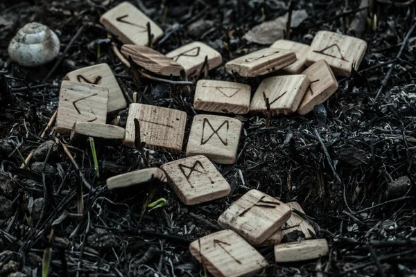 Wooden runes on the ground — Stock Photo, Image