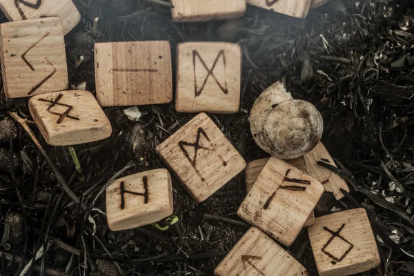 Wooden runes on the ground — Stock Photo, Image