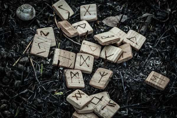 Wooden runes on the ground — Stock Photo, Image