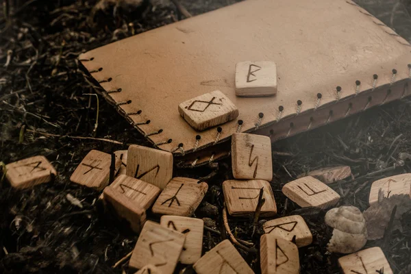 Wooden runes on the ground — Stock Photo, Image