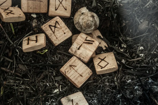 Wooden runes on the ground — Stock Photo, Image