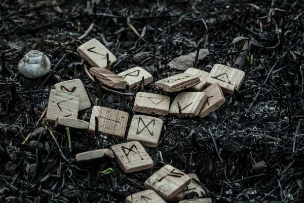 Wooden runes on the ground — Stock Photo, Image