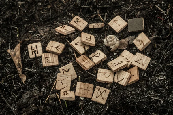 Wooden runes on the ground — Stock Photo, Image