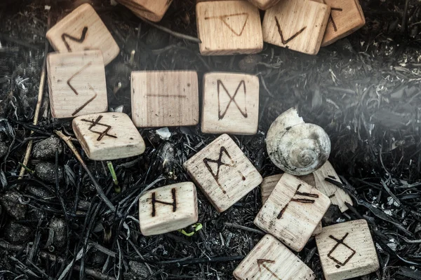 Wooden runes on the ground — Stock Photo, Image