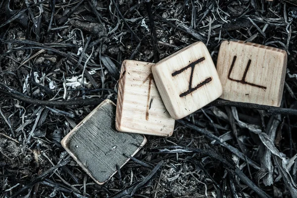 Wooden runes on the ground — Stock Photo, Image