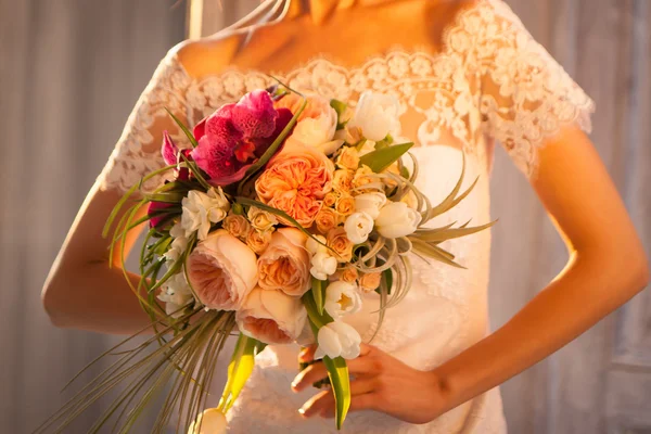 Young attractive bride with flowers — Stock Photo, Image