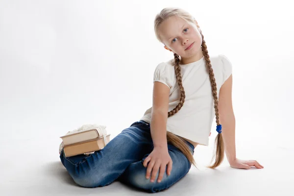 Beautiful little girl with long blonde hair — Stock Photo, Image