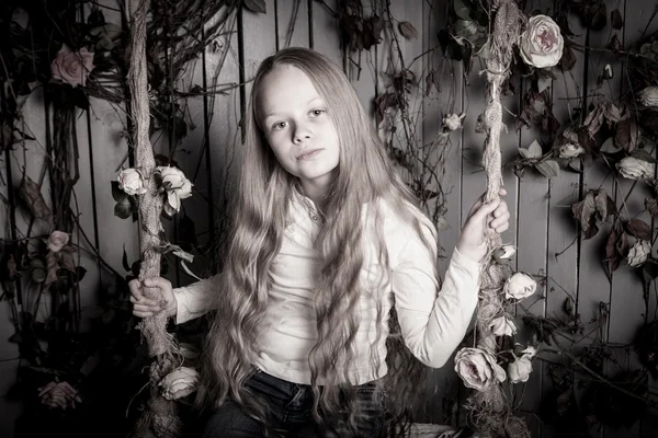 Beautiful little girl with long blonde hair — Stock Photo, Image