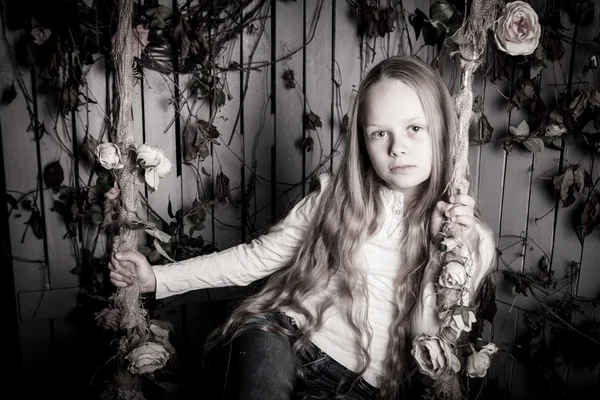 Beautiful little girl with long blonde hair — Stock Photo, Image