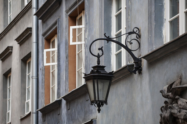 Street lamp and Houses in the Old Town of Warsaw, Poland.