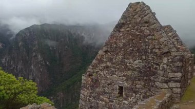 Machu Picchu ancient city view from Huchu'y Picchu in cloudy weather