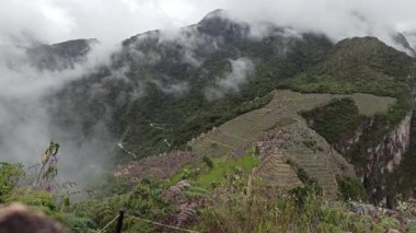 Machu Picchu ancient city view from Huchu'y Picchu in cloudy weather