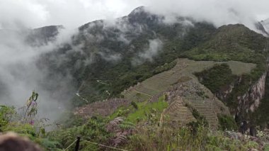 Machu Picchu ancient city view from Huchu'y Picchu in cloudy weather