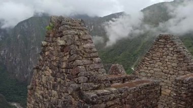 Machu Picchu ancient city view from Huchu'y Picchu in cloudy weather