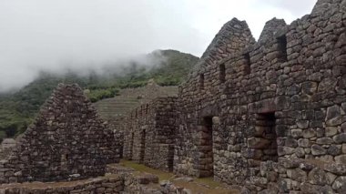 Machu Picchu ancient city view from Huchu'y Picchu in cloudy weather