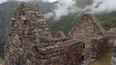 Machu Picchu ancient city view from Huchu'y Picchu in cloudy weather