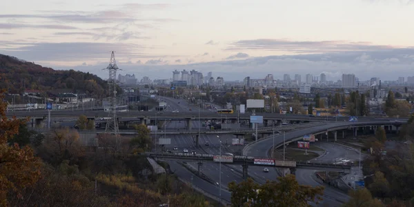 Kiev cityscape. view of industrial part of the city on sunset time on october — Stock Photo, Image