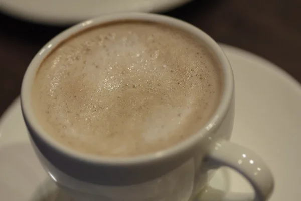 Una taza de café con leche —  Fotos de Stock