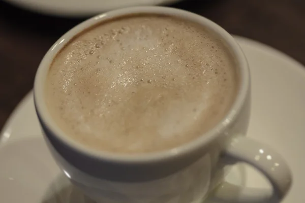 Una taza de café con leche —  Fotos de Stock